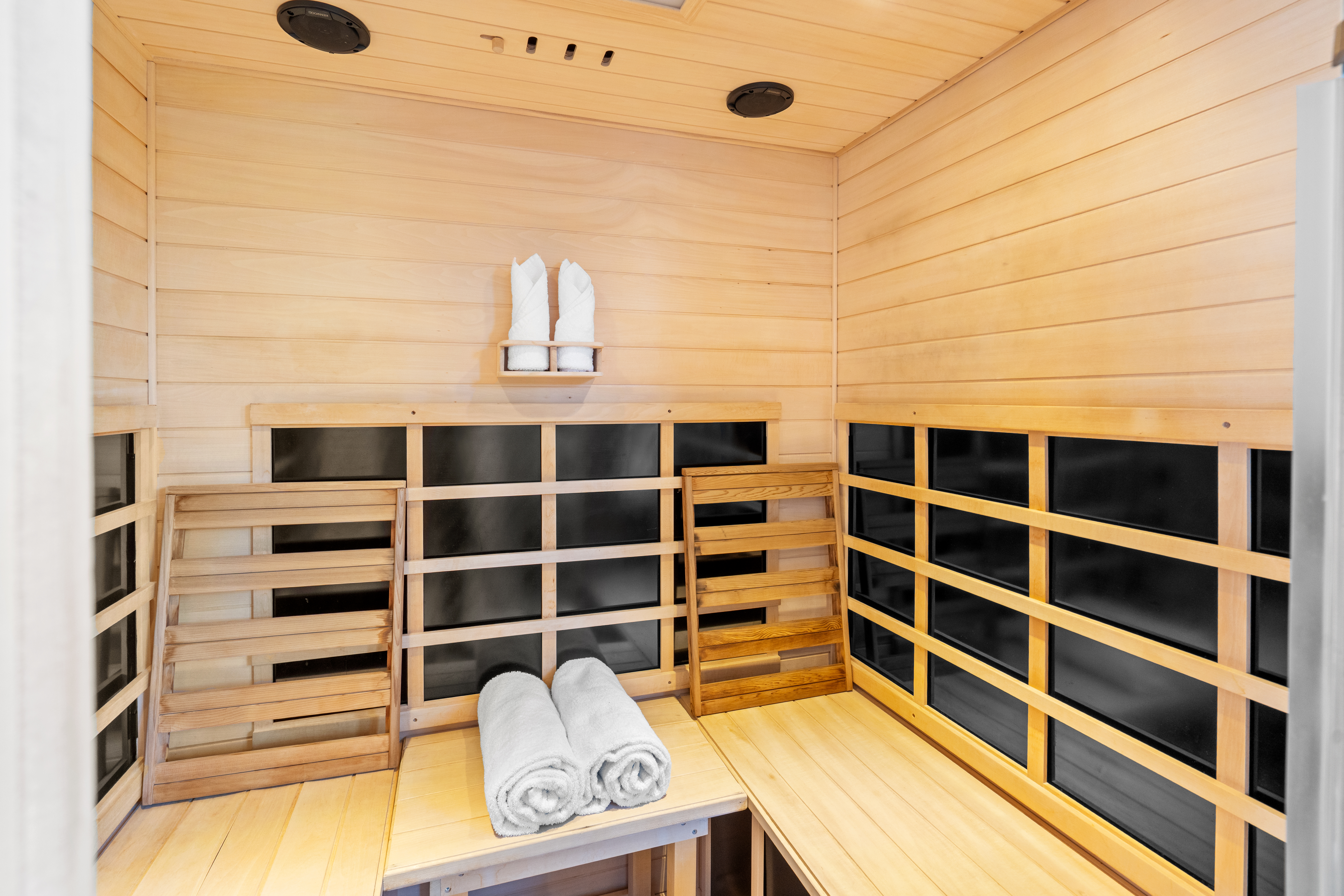 Pampering package treatment room with candles and spa setup
